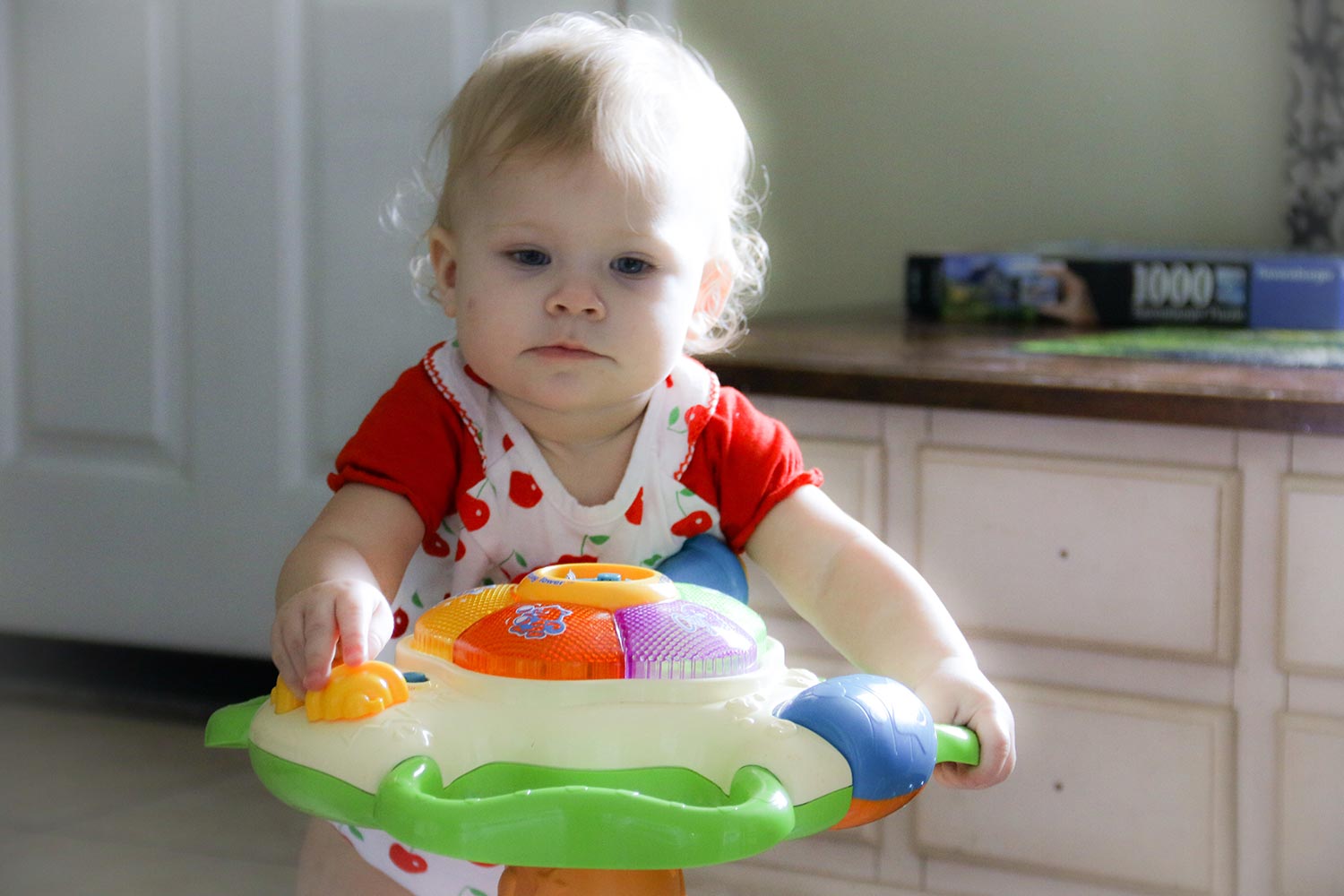 child playing with toys in room